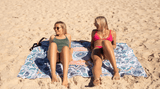 Two women relaxing on a Nakie XL beach towel Nakie - Australia