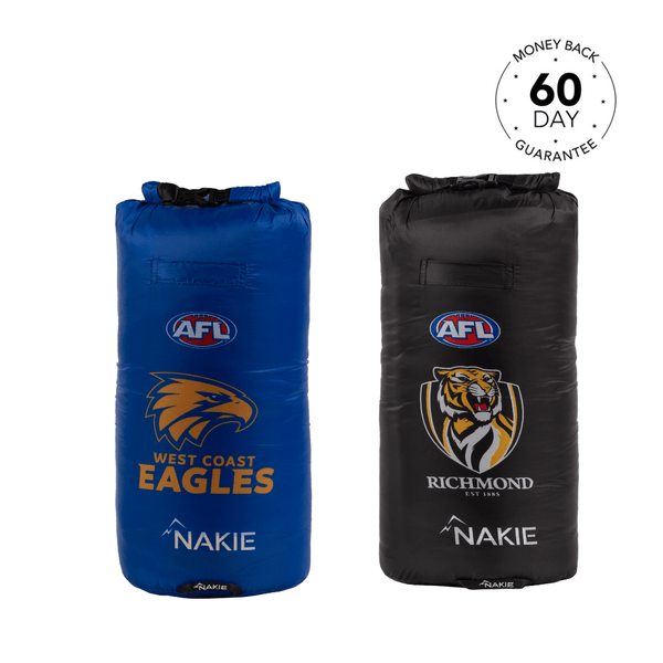 Two AFL team dry bag blankets, one blue West Coast Eagles and one black Richmond Tigers, with roll-top closures and Nakie branding