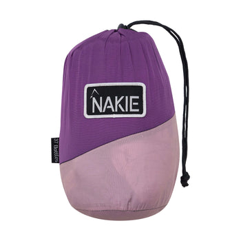 Purple Nakie hammock displayed in a studio setting, highlighting its lightweight and compact features