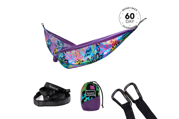Kasey Rainbow recycled hammock with purple straps, colorful abstract pattern, includes black carabiners and storage bag.