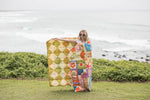 Retro Shores sustainable down puffy blanket with geometric diamond and colorful patchwork pattern preview #5