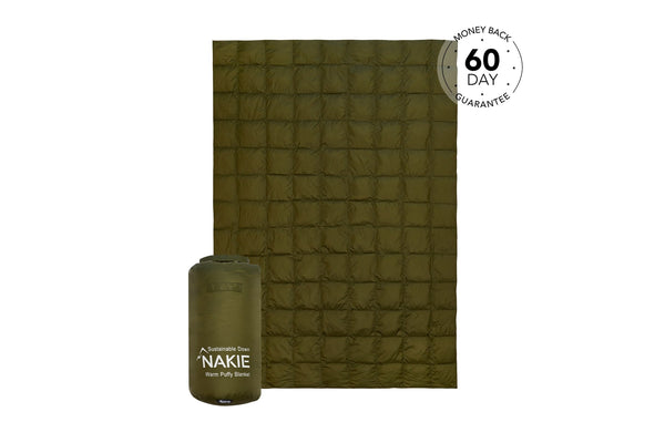 Olive green puffy blanket with quilted box pattern, shown unfolded and rolled in carrying pouch with Nakie branding
