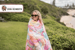 Multicolor pastel patchwork quilted down blanket draped over woman's shoulders outdoors preview #2