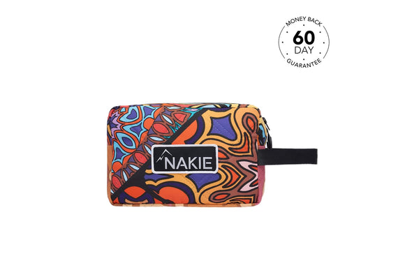 Nakie multicolor abstract print toiletry bag with black handle and branded label patch