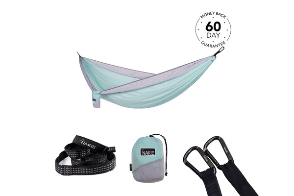 Twilight Blue recycled hammock with gray straps, shown suspended with matching storage bag and black carabiners below